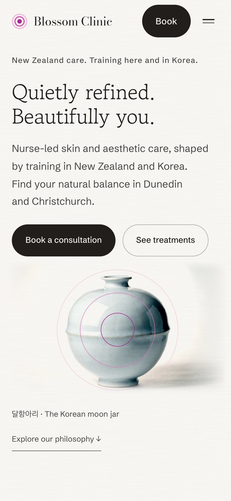 Blossom Clinic website on a phone